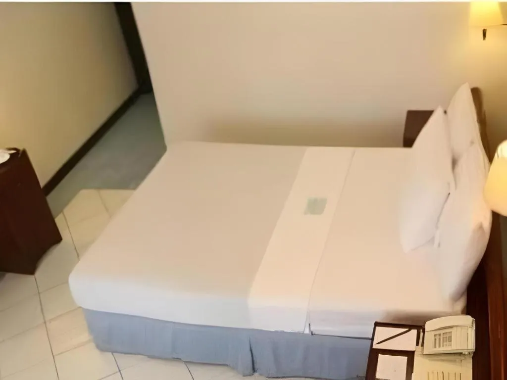 Bed in Soledad Suites