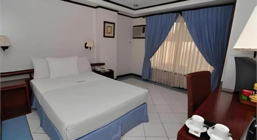 Bed in Soledad Suites