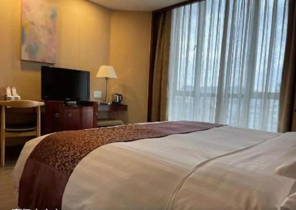 Bed in Jinrong International Hotel