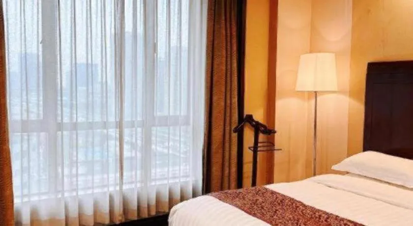 Bed in Jinrong International Hotel