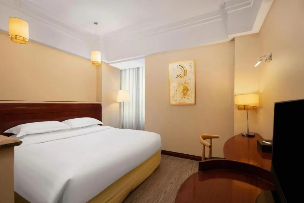 Bed in Jinrong International Hotel