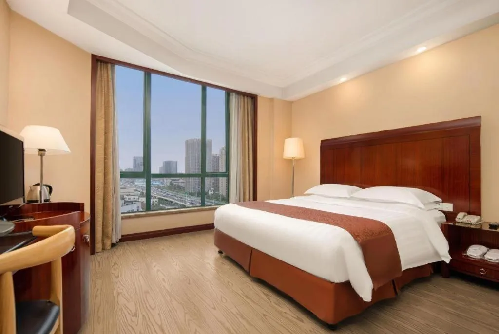 Bed in Jinrong International Hotel