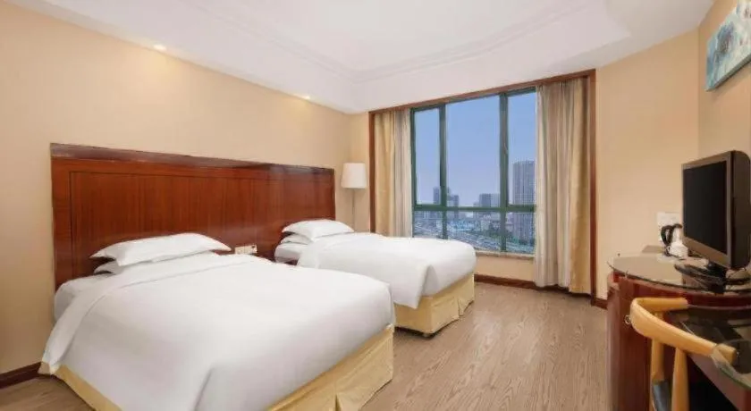 Bed in Jinrong International Hotel