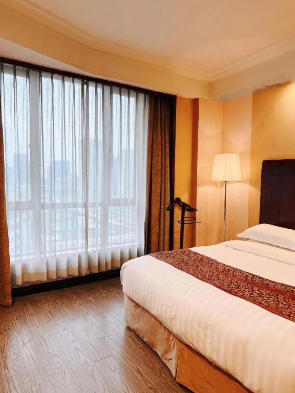 Bed in Jinrong International Hotel