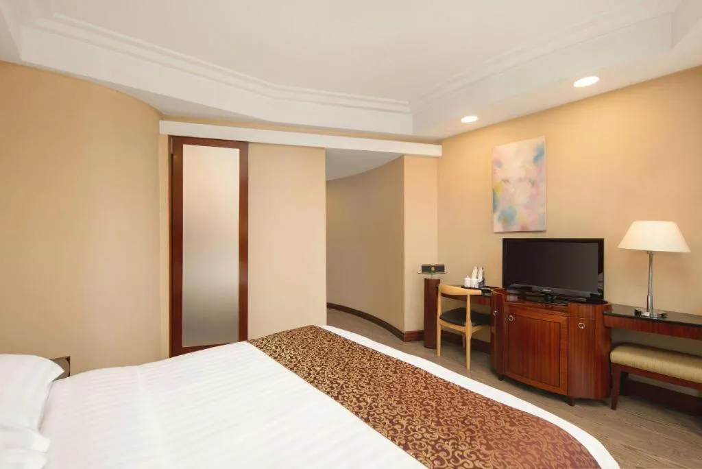 Bed in Jinrong International Hotel