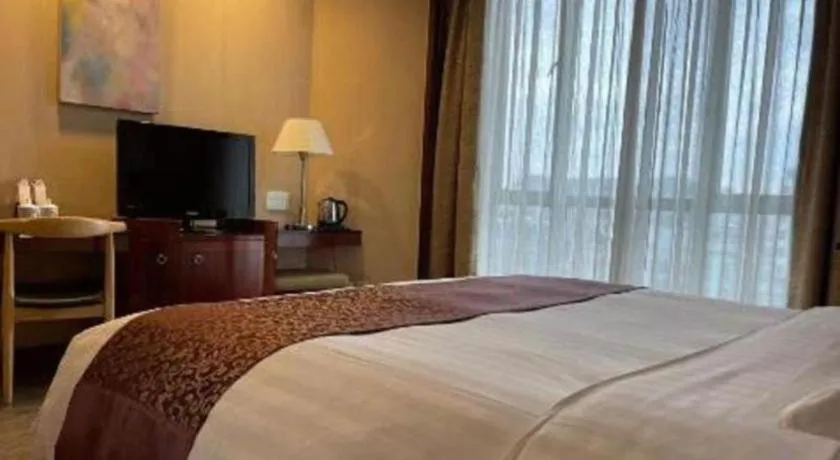 Bed in Jinrong International Hotel