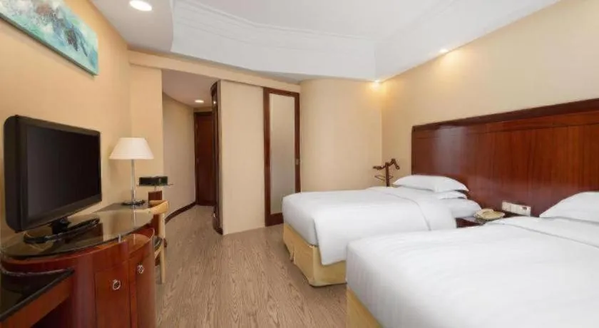 Bed in Jinrong International Hotel