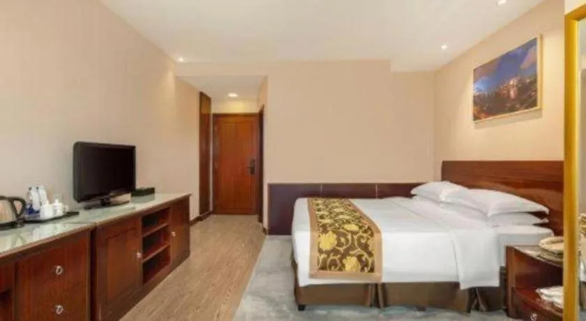 Bed in Jinrong International Hotel