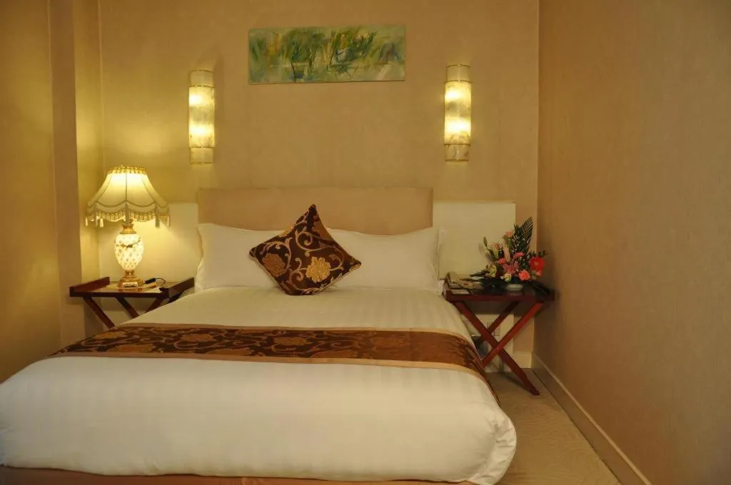 Bed in Jinrong International Hotel