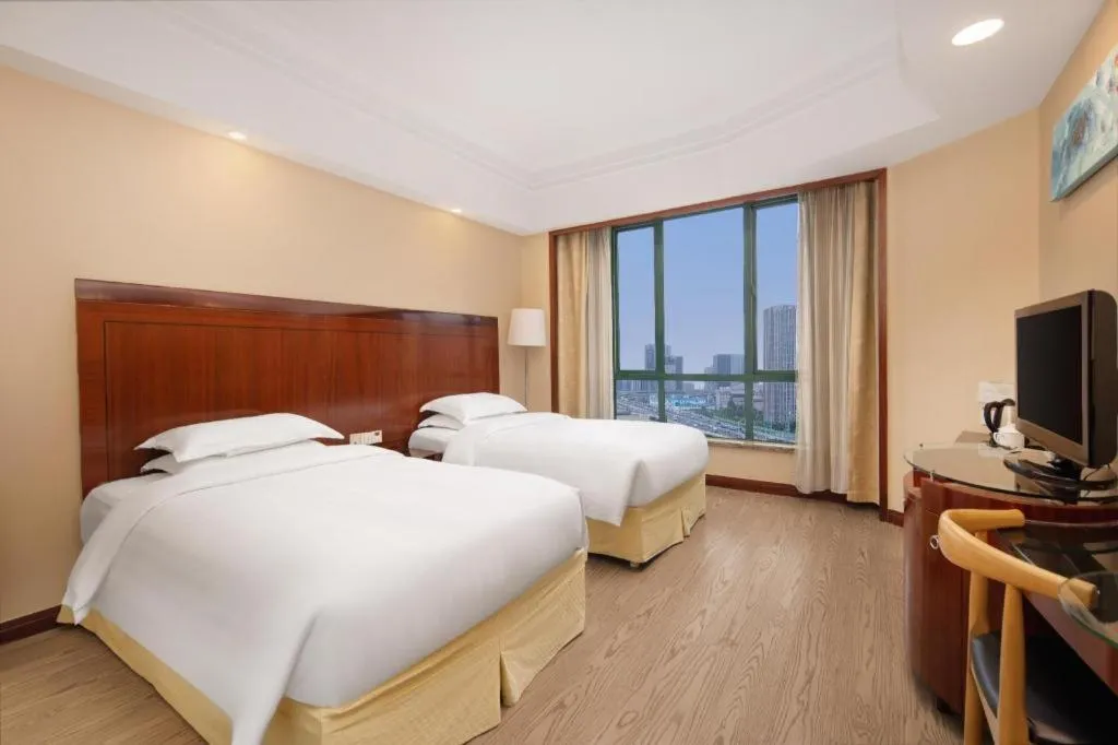 Bed in Jinrong International Hotel