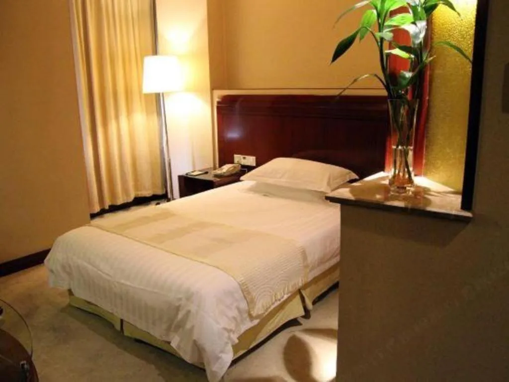 Bed in Jinrong International Hotel