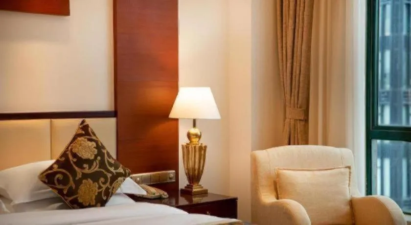 Bed in Jinrong International Hotel