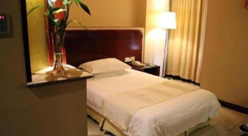 Bed in Jinrong International Hotel