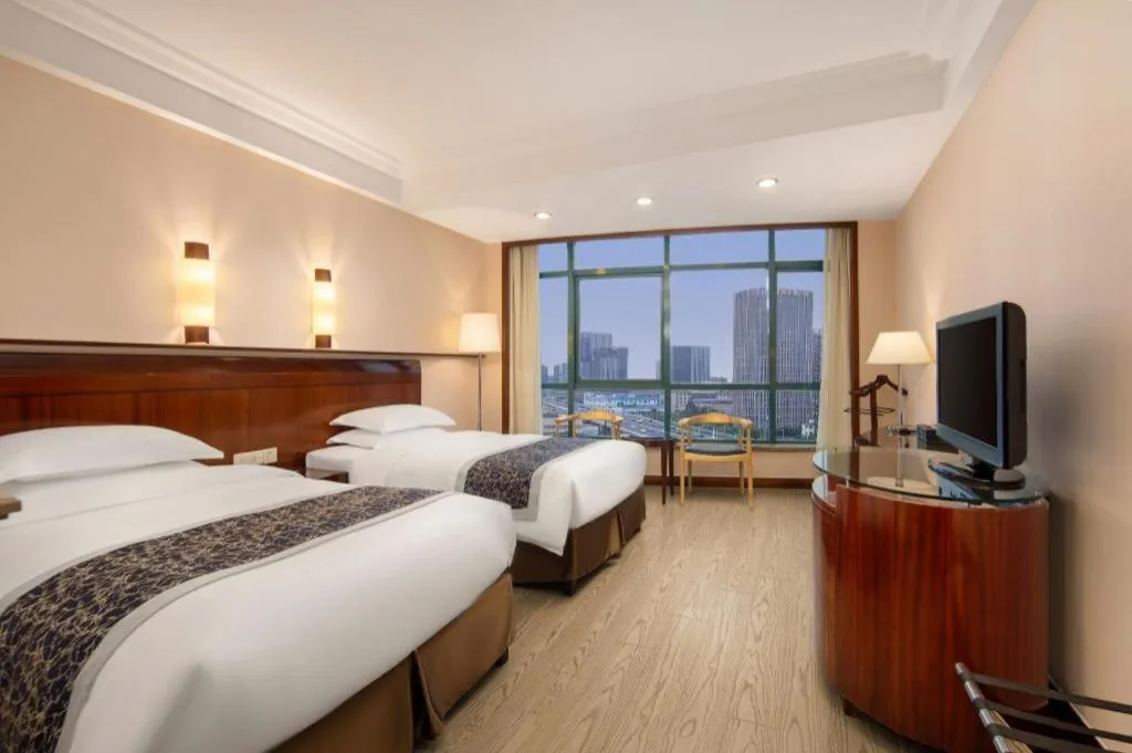 Bed in Jinrong International Hotel