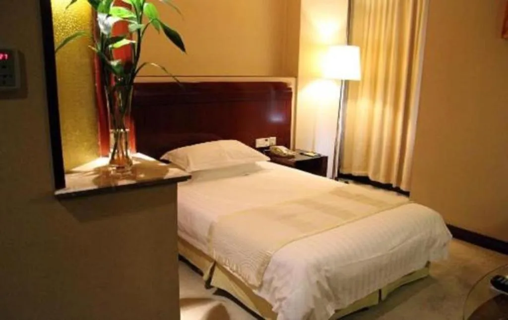 Bed in Jinrong International Hotel