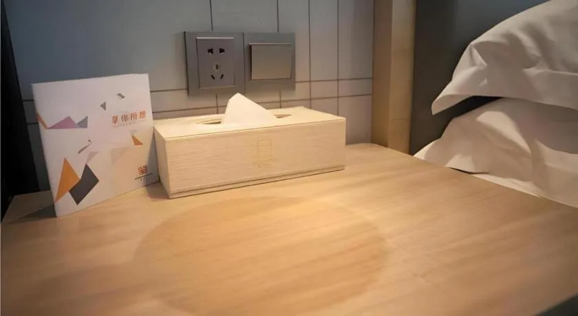 Bed in Echarm Hotel Guiyang International Convention & Exhibition Center