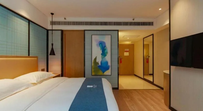 Bed in Echarm Hotel Guiyang International Convention & Exhibition Center