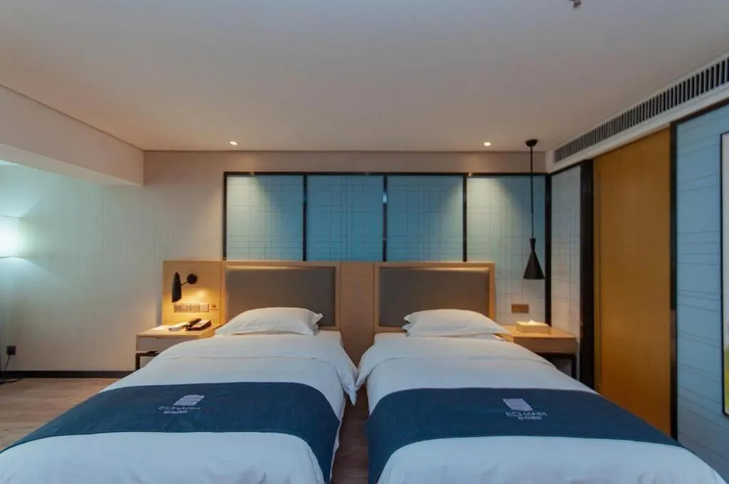 Bed in Echarm Hotel Guiyang International Convention & Exhibition Center