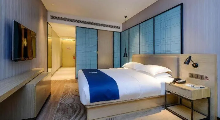 Bed in Echarm Hotel Guiyang International Convention & Exhibition Center