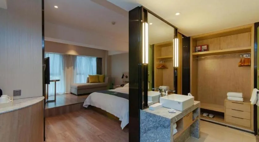 Bed in Echarm Hotel Guiyang International Convention & Exhibition Center