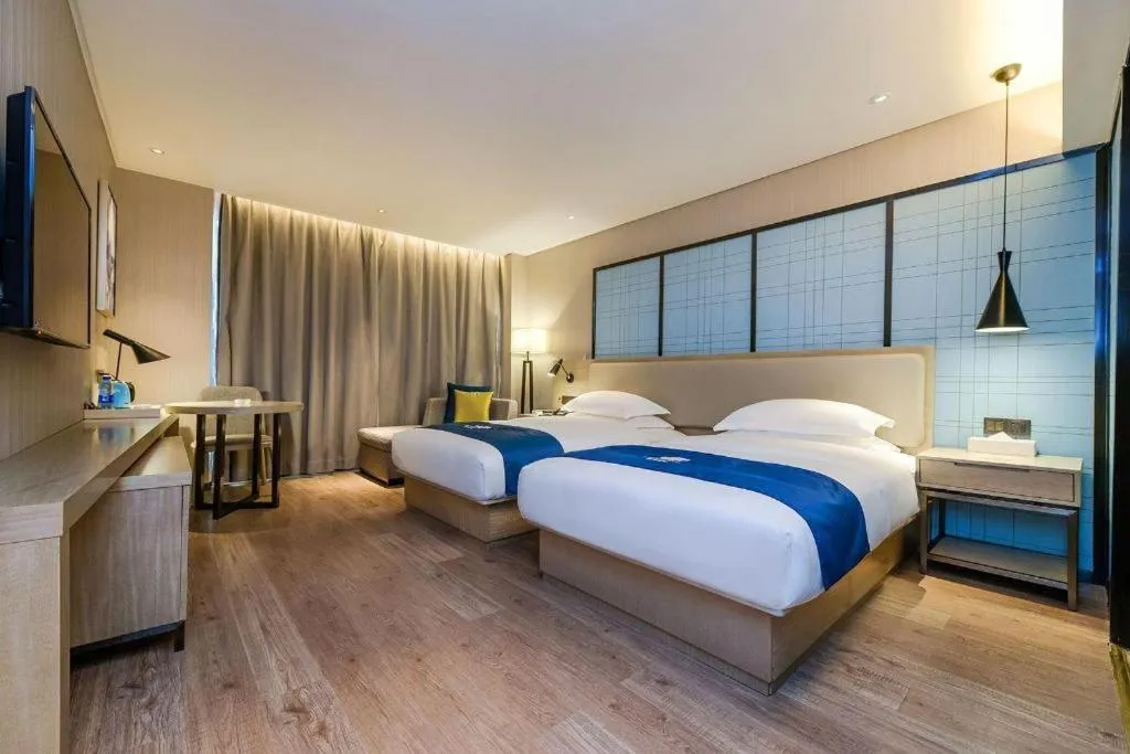 Bed in Echarm Hotel Guiyang International Convention & Exhibition Center