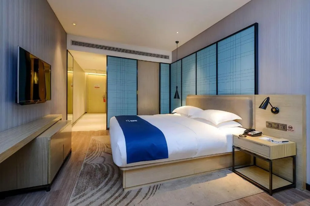Bed in Echarm Hotel Guiyang International Convention & Exhibition Center