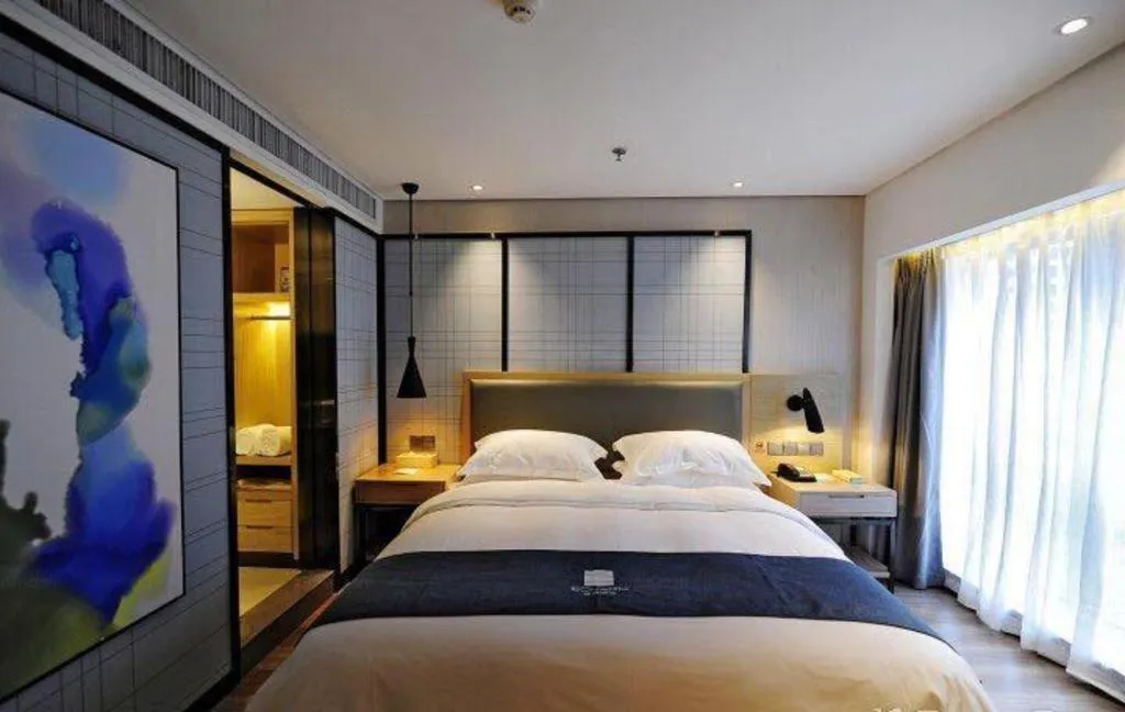 Bed in Echarm Hotel Guiyang International Convention & Exhibition Center