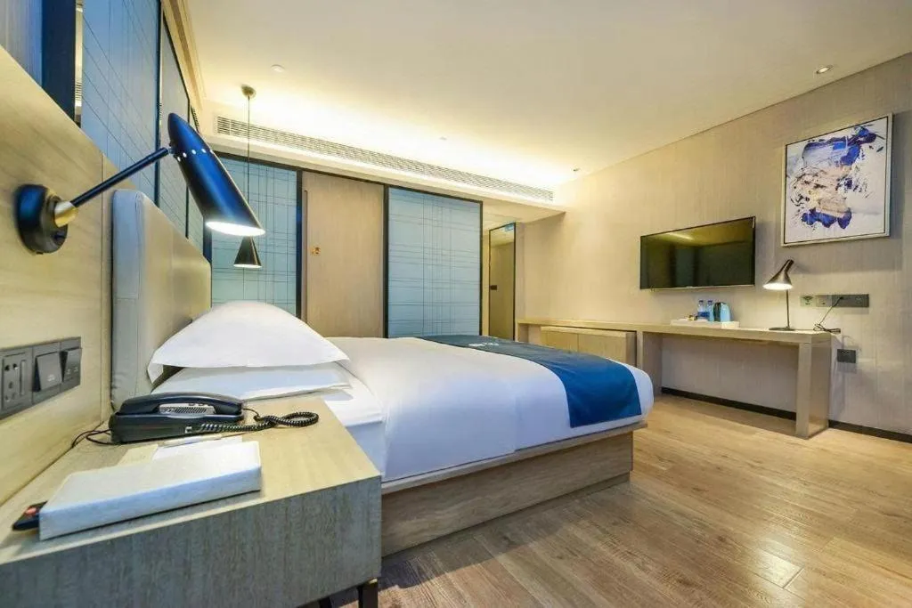 Bed in Echarm Hotel Guiyang International Convention & Exhibition Center