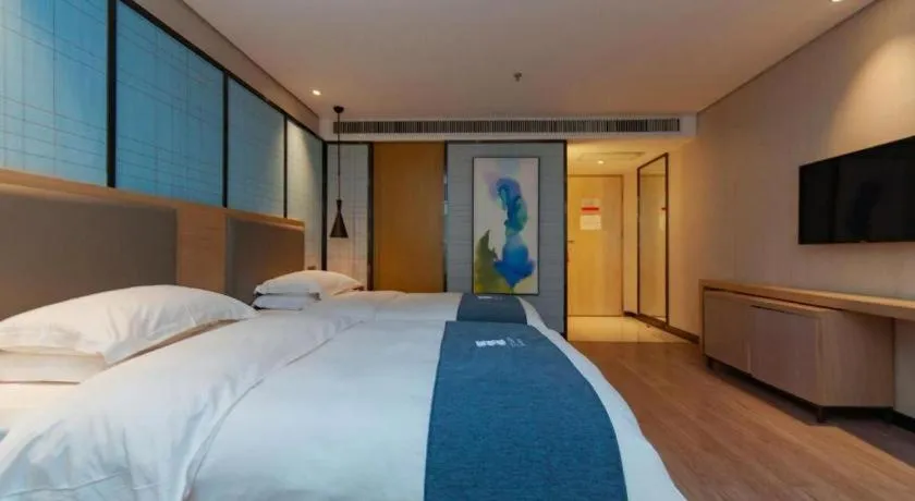 Bed in Echarm Hotel Guiyang International Convention & Exhibition Center