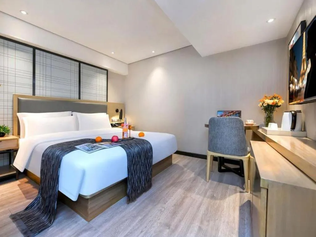 Bed in Echarm Hotel Guiyang International Convention & Exhibition Center