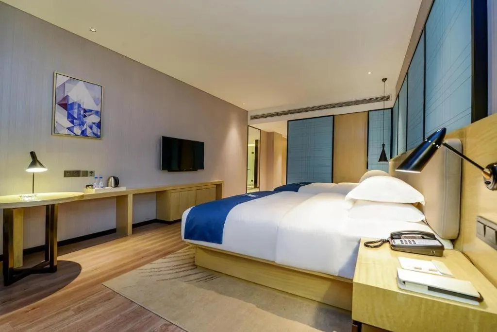 Bed in Echarm Hotel Guiyang International Convention & Exhibition Center