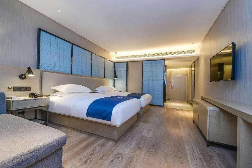 Bed in Echarm Hotel Guiyang International Convention & Exhibition Center