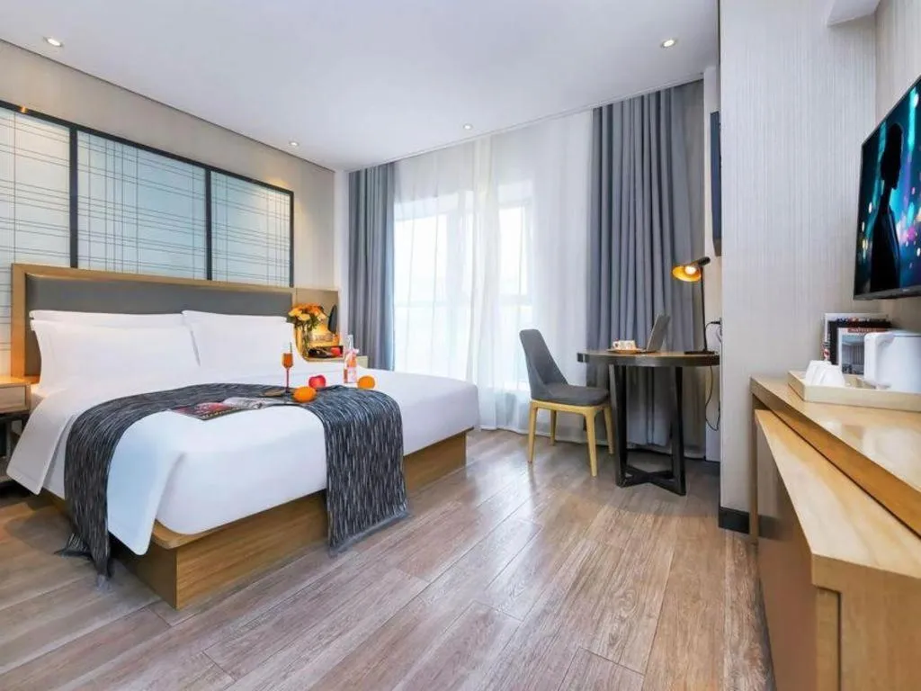Bed in Echarm Hotel Guiyang International Convention & Exhibition Center