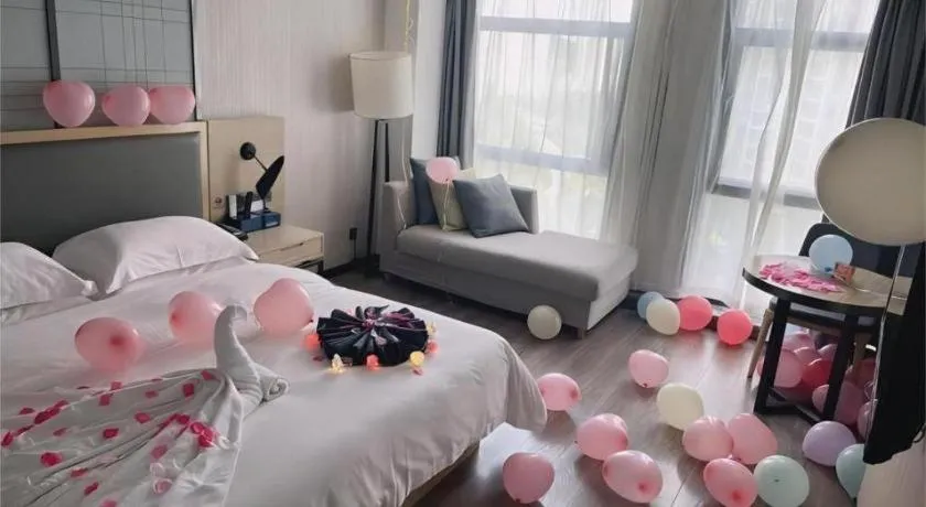 Bed in Echarm Hotel Guiyang International Convention & Exhibition Center