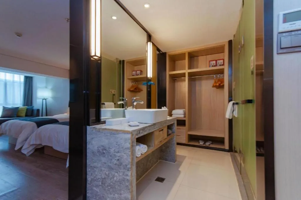 Bed in Echarm Hotel Guiyang International Convention & Exhibition Center