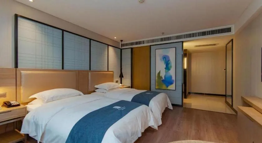 Bed in Echarm Hotel Guiyang International Convention & Exhibition Center