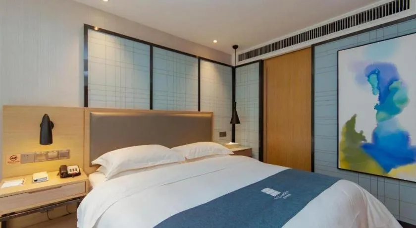 Bed in Echarm Hotel Guiyang International Convention & Exhibition Center