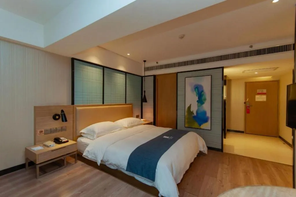 Bed in Echarm Hotel Guiyang International Convention & Exhibition Center