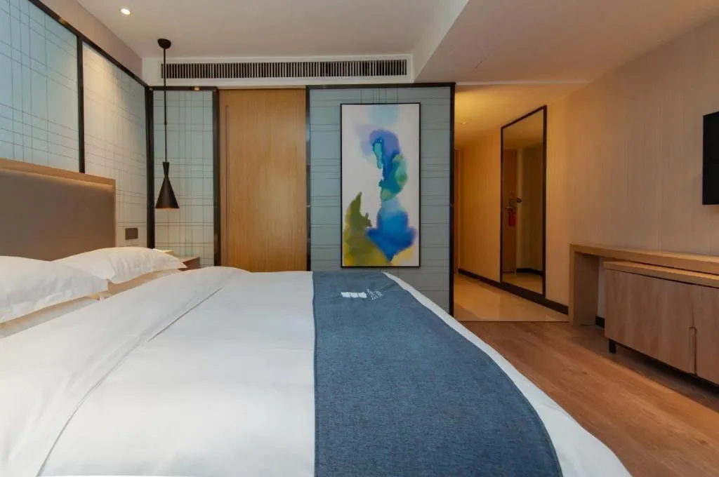 Bed in Echarm Hotel Guiyang International Convention & Exhibition Center