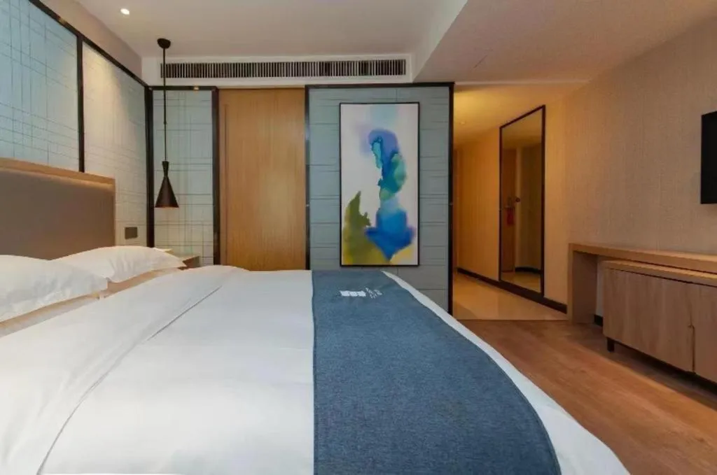 Bed in Echarm Hotel Guiyang International Convention & Exhibition Center