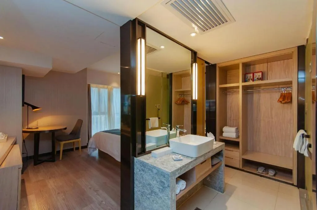 Bed in Echarm Hotel Guiyang International Convention & Exhibition Center