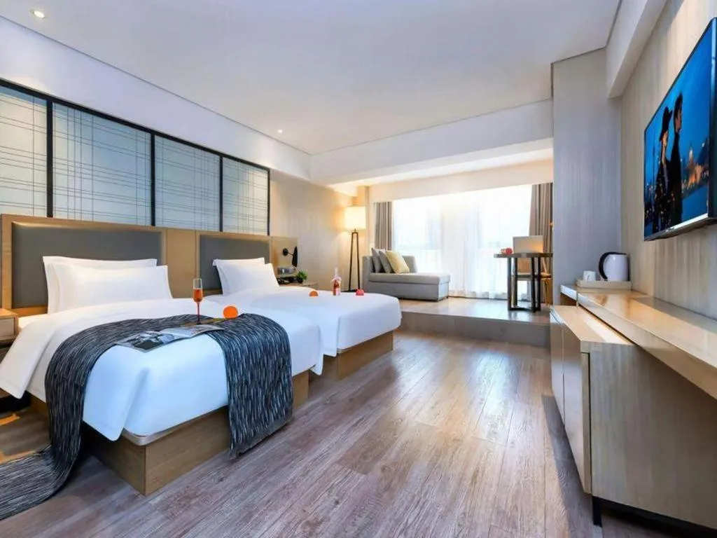 Bed in Echarm Hotel Guiyang International Convention & Exhibition Center