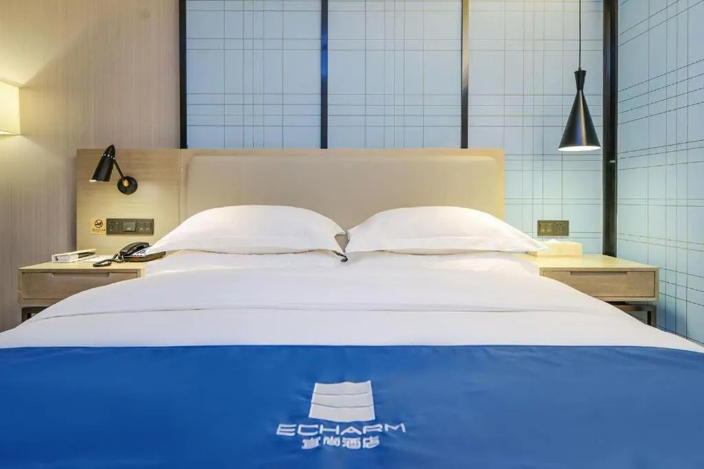 Bed in Echarm Hotel Guiyang International Convention & Exhibition Center