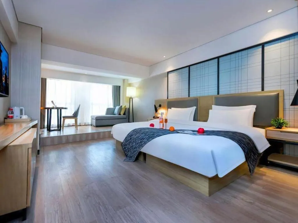 Bed in Echarm Hotel Guiyang International Convention & Exhibition Center