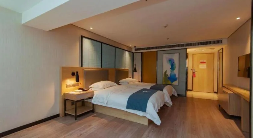 Bed in Echarm Hotel Guiyang International Convention & Exhibition Center