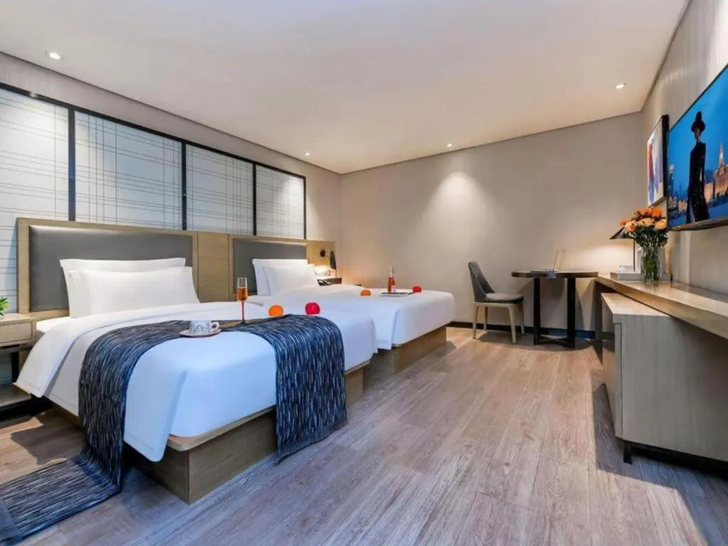 Bed in Echarm Hotel Guiyang International Convention & Exhibition Center