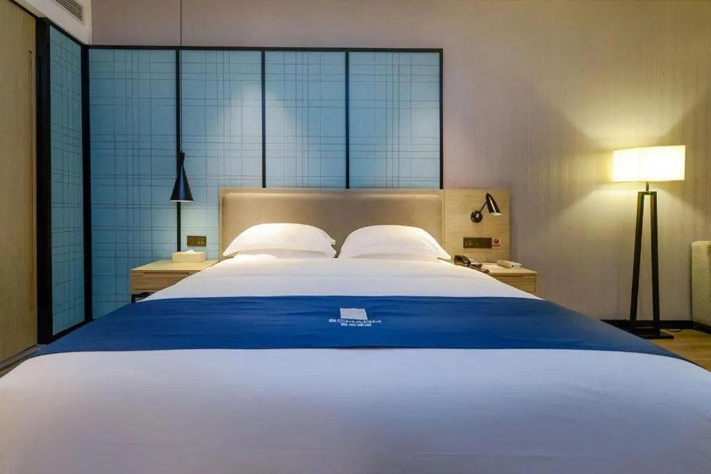 Bed in Echarm Hotel Guiyang International Convention & Exhibition Center