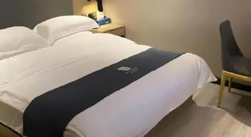 Bed in Echarm Hotel Guiyang International Convention & Exhibition Center
