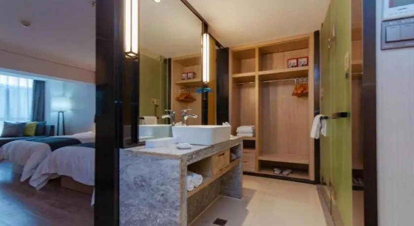 Bed in Echarm Hotel Guiyang International Convention & Exhibition Center