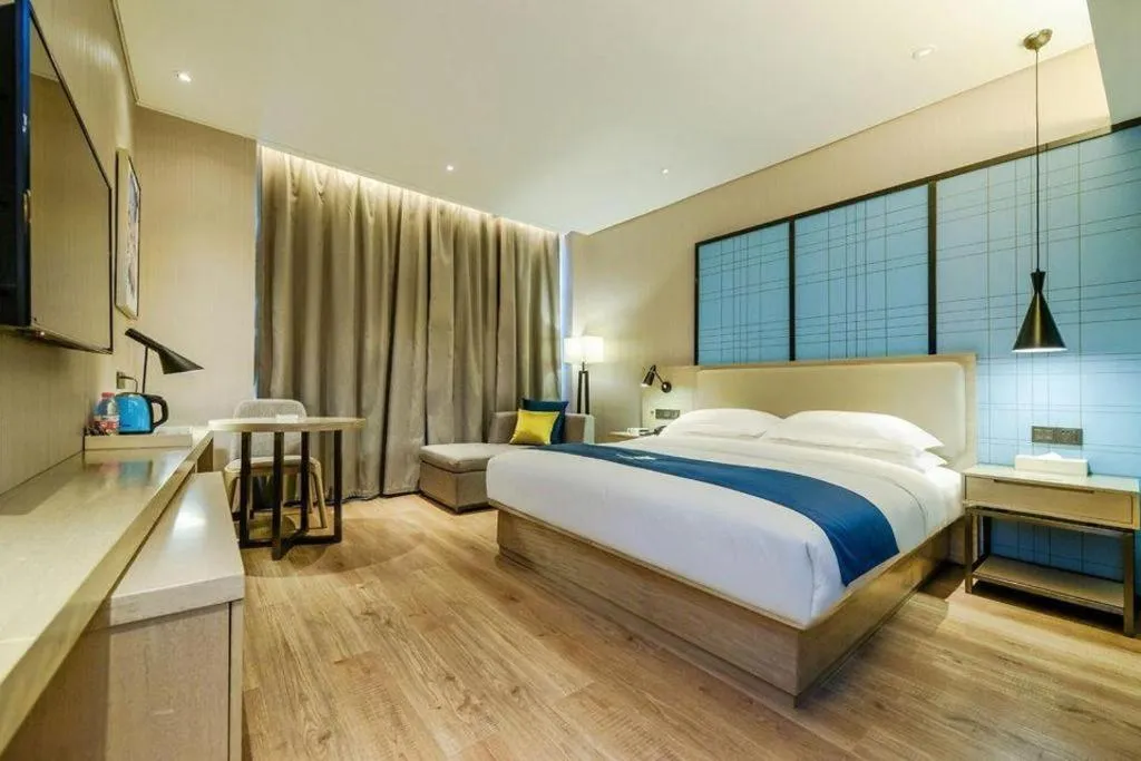 Bed in Echarm Hotel Guiyang International Convention & Exhibition Center
